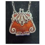 VCLM red enamel and rhinestone purse locket