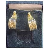 Two gold colored earrings for pierced ears