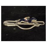 horse racing tie bar, typically styled in an Art