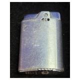 Ronson Capri petrol pocket lighter in a