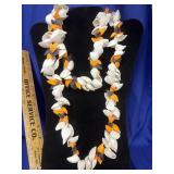 handcrafted seashell lei necklace featuring an