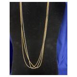multi-strand tri-color necklace featuring