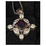 red gemstone pendant necklace featuring a square