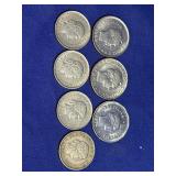 circulated Colombia 10 Centavos coins, likely