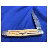 Camco folding pocket knife, resembling a