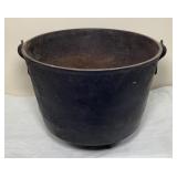 Antique Cast Iron Cowboy Bean Pot]