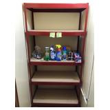 Red Metal Shelving Unit And Cleaning Supplies