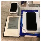 Amazon Kindle And Two Smartphones