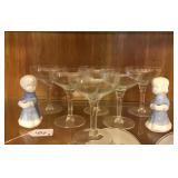 Glass Champagne Coupes And Figural Candle Holders