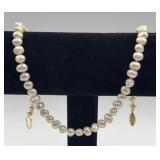 Single strand pearl necklace. 18"