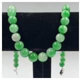 Green Jade single strand beaded necklace. 17"