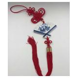 Chinese knot with a blue-and-white porcelain fan