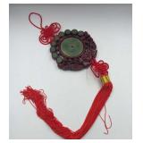 Chinese red knot wall hanging with a faux jade