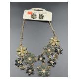 Gold tone floral statement necklace & earrings.