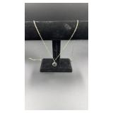 silver tone necklace w/ faceted crystal ball