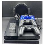 Play Station 4 w/ accessories.