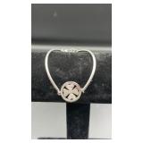 Silver tone bracelet w/ heart charm