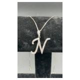 Silver tone necklace w/ N pendant. 20"