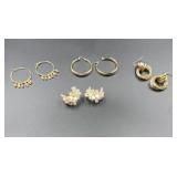 Assorted gold tone earrings