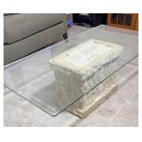 tessellated stone base coffee table W/ glass top.