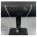 silver tone necklace w/ faceted crystal ball