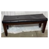 Cushioned wooden bench. 48x16x20'