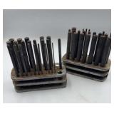 Two Graduated Punch/Pin Sets in Metal StandsA