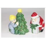 Hiding Behind Christmas Tree Watching Santa Claus
