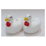 White Ducks in Red Bows