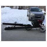 Log saw powered by an Economy engine.