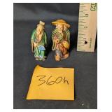 Pair of VTG mud man ceramic figurines