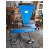 Gas-powered wood chipper and shredder hopper.