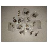 Lot of vacation themed gold tone charms