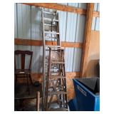 Vintage metal and wooden ladders