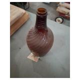 Vintage amber glass swirl demijohn bottle