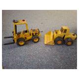 Vintage pressed-steel toy loader,