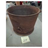 Antique cast iron flat-bottom kettle