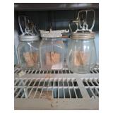 Vintage glass hand-crank butter churns,