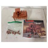 Barrel loader building