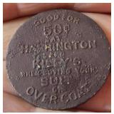 C. 1898-1903  Brass clothing token