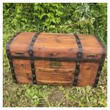 Antique wooden dome-top trunk