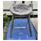 Antique rustic wooden farm milking stool