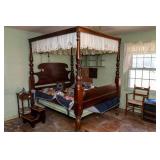 Large antique poster bed, small side table and bed