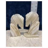 carved stone horse head bookends