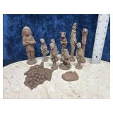 ceramic bisque figurines and wall plaques.