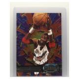 Hakeem Olajuwon 1997 Fleer Metal Universe