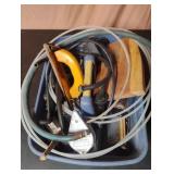 Ultra caddy with contents including hoses, hand