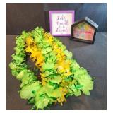 Good vibes bank and flower necklaces, wall decor