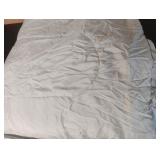Comforter. Light grey in color. Full size