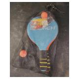 Paddle game in mesh bag